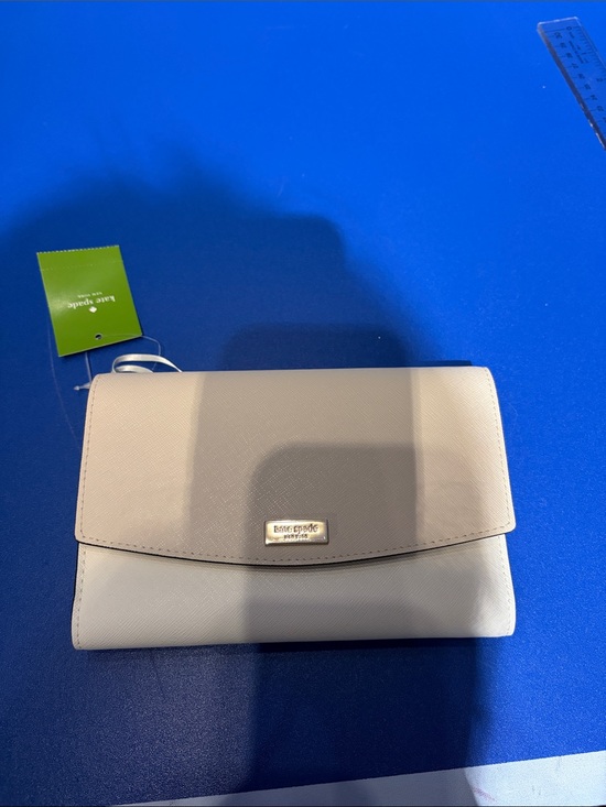 kate spade Handbags - kate spade two-tone beige and cream flap wallet